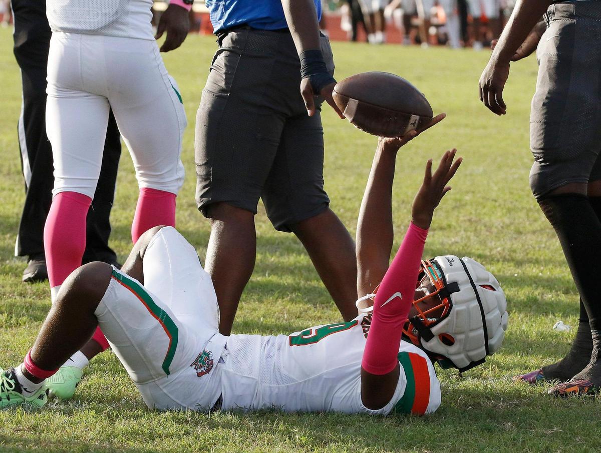 Blanche Ely Tigers quarterback Omari McNeil (9) celebrates a touchdown against Dillard Panthers during football game on Saturday, October 19, 2024 at Dillard HS in Fort Lauderdale. Andrew Uloza / for Miami Herald