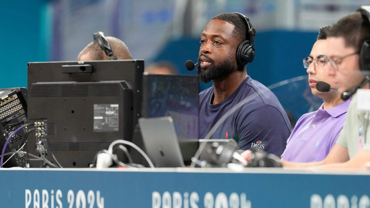 Dwyane Wade looks on from the media bench during the first half between Canada and Greece during the Paris 2024 Olympic Summer Games at Stade Pierre-Mauroy.