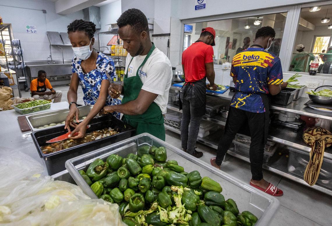 Workers prepare vegetables for World Central Kitchen in Les Cayes, Haiti where thousands of hot meals are prepared daily to feed victims of the August 14, 2021 earthquake.