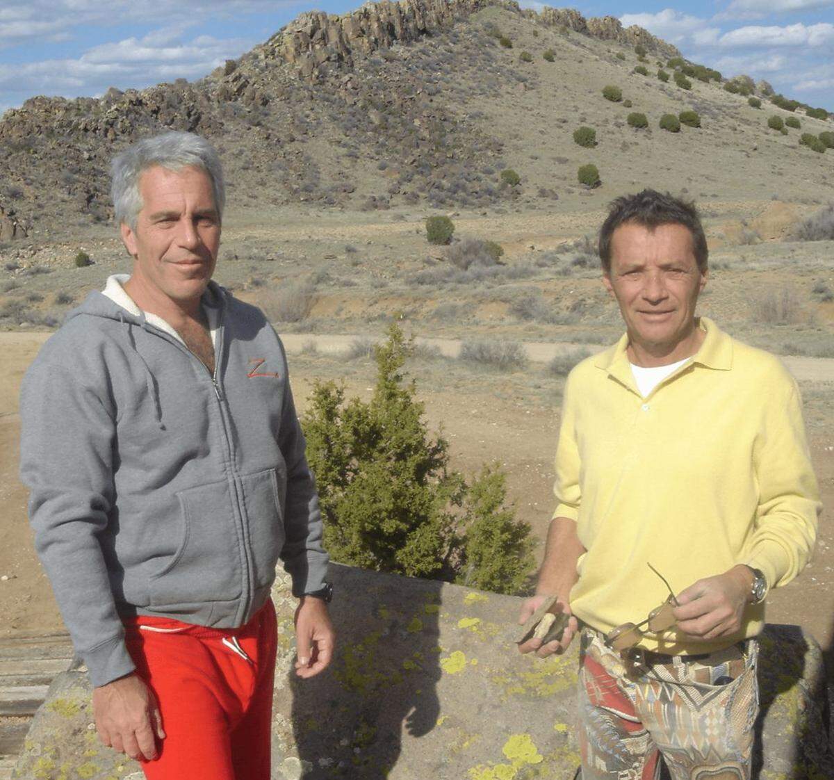 An undated photo showing Jeffrey Epstein (L) and model scout Jean-Luc Brunel (R).