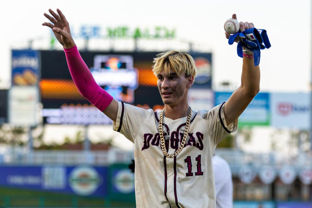 Marjory Stoneman Douglas base runner Nick Diaz (11) reacts after hitting a walk-off single to defeat Windermere 3-2 in extra innings for the Class 7A state baseball championship game at Hammond Stadium on Saturday, May 18, 2024, in Fort Myers, Fla.