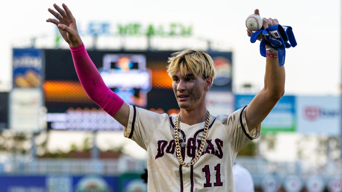 Marjory Stoneman Douglas’ Nick Diaz (11) reacts after hitting a walk-off single to defeat Windermere 3-2 in extra innings for the Class 7A state baseball championship game at Hammond Stadium on Saturday, May 18, 2024, in Fort Myers, Fla.