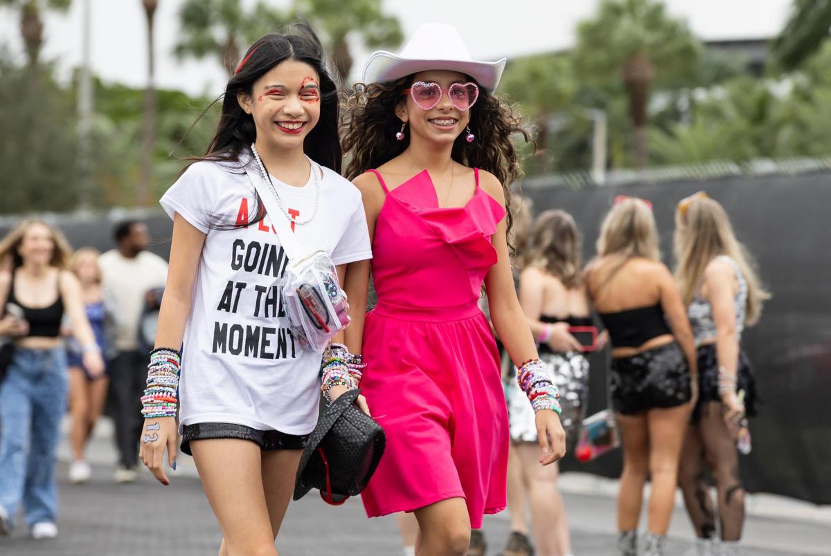 Ariana Bendayan, 13, left, and Alannah Padua, 13, arrive to Hard Rock Stadium to watch Taylor Swift’s The Eras Tour on Friday, Oct.18, 2024, in Miami Gardens, Fla.