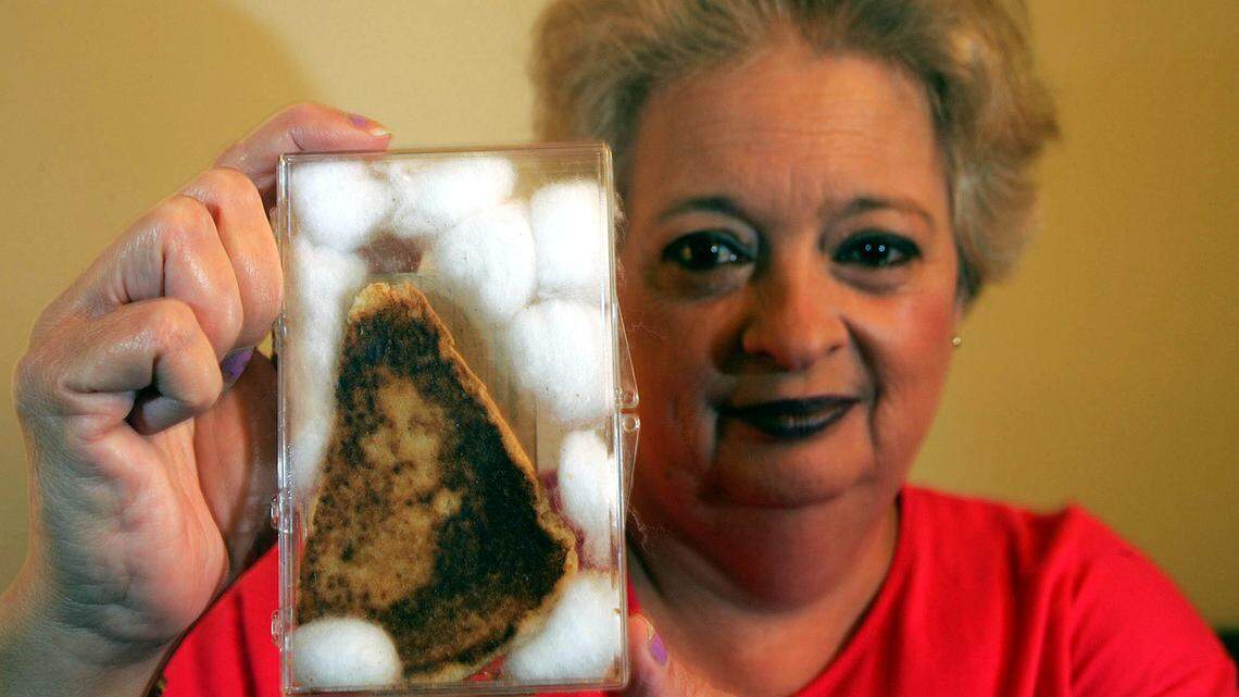 Diana Duyser of Hollywood shows a cheese sandwich with what she believes to be an image of the Virgin Mary on it. In 10 years, no mold has formed.