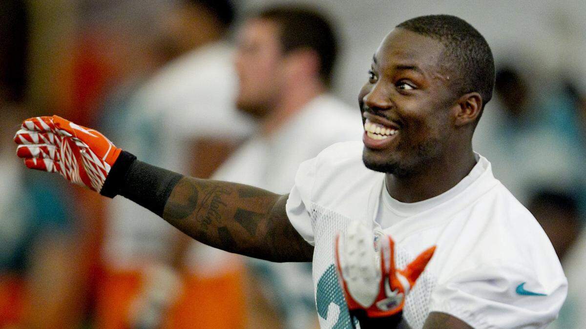 Cornerback Vontae Davis has a good time during the Miami Dolphins Mini Camp at Nova Southeastern University in Davie on June 21, 2012.