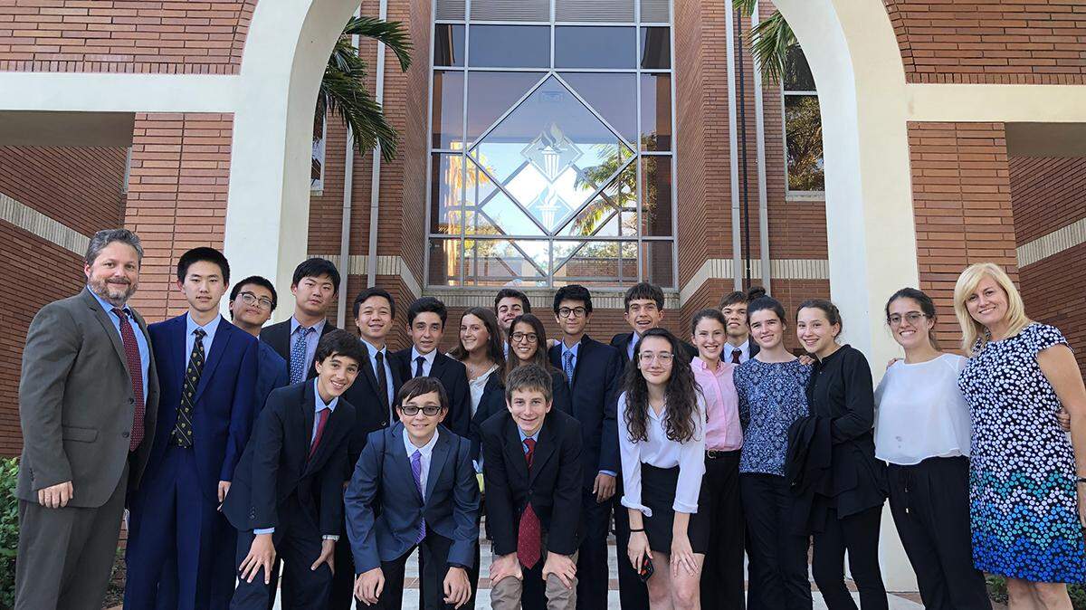 The Model United Nations team from Palmer Trinity School recently competed in the Florida High School Model United Nations’ Gulf Coast Six Conference in Punta Gorda. The students are pictured with their teachers Derek Smith, far left, and Ania Fernandez, far right.