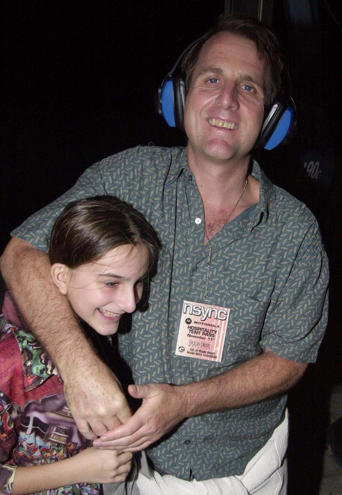 File photo of writer Tom Austin with his daughter Claire at an N’Sync concert in South Beach in 2001.