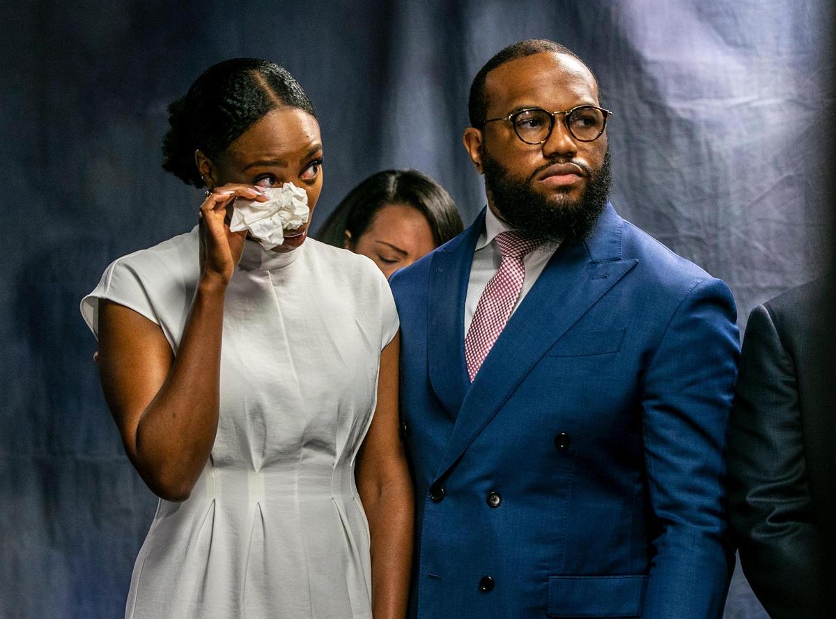 Family members Karen Egbuna and Jeffrey Obumselii react as Miami-Dade County State Attorney Katherine Fernandez Rundle, unsealed the arrest warrant for model Courtney Clenney on Thursday, one day after U.S. marshals arrested her in Hawaii, for the homicide of Christian Obumseli, last April 03 in Miami, on Thursday August 11, 2022.