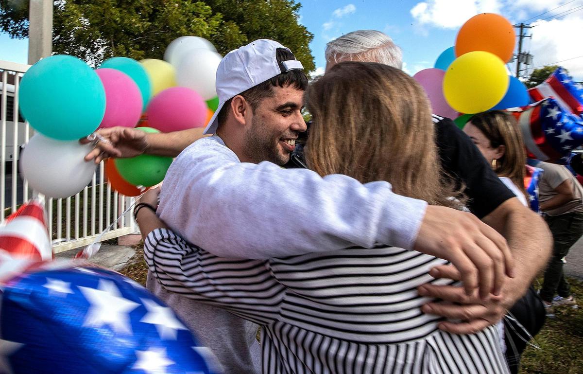 Detainee Jose Enrique Bernal is welcomed by his mother, Gladys Castillo, after being released from the Broward Transitional Center in Pompano