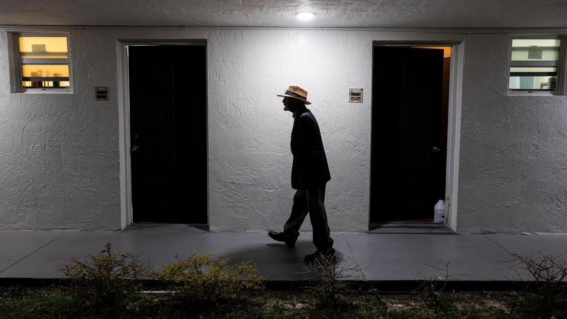 Orlando Palma, 73, walks past resident rooms at Mia Casa on Thursday, Dec. 19, 2024, in North Miami, Florida. Mia Casa, acquired by Miami-Dade County’s Homeless Trust, supports over 120 homeless seniors aged 65 and older with shelter and assistance transitioning to permanent housing.