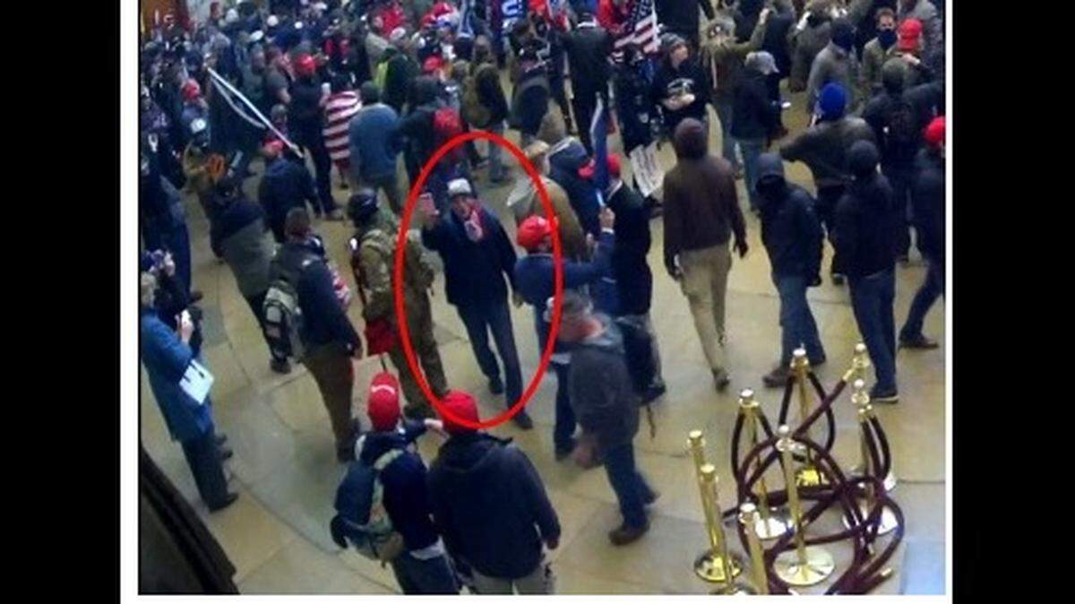 Screenshot from video footage allegedly shows Julio Chang in the Rotunda of the Capitol building on the afternoon of Jan. 6. Chang, (circled) is seen wearing the same clothing he had on in a photo posted on social media. The image was included as evidence on an FBI filing with a Washington federal court on Sept. 23, 2021.