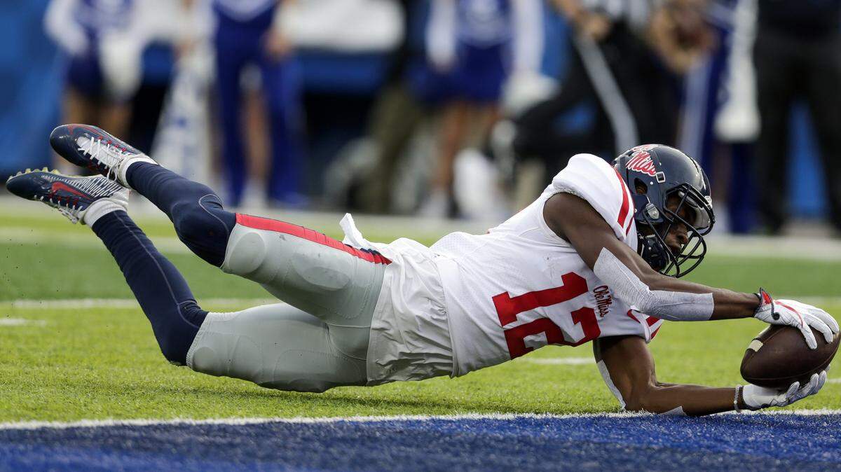 Mississippi wide receiver Van Jefferson scores a touchdown during the first half of an NCAA college football game against Kentucky, Saturday, Nov. 4, 2017, in Lexington, Ky.