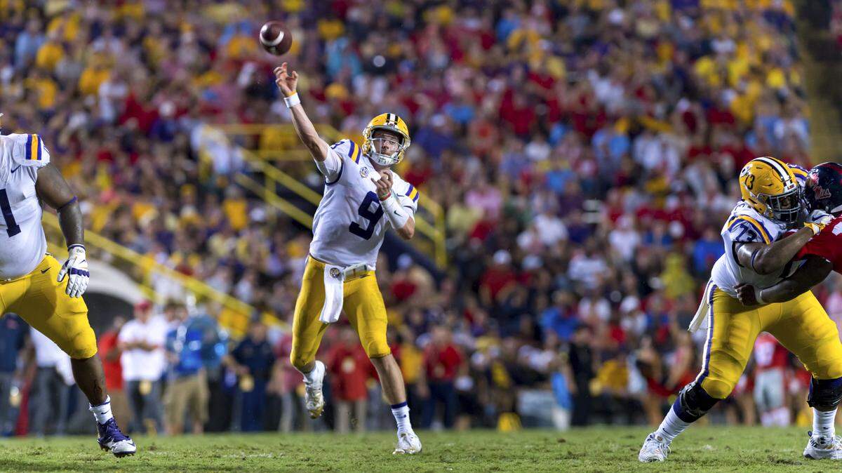 LSU quarterback Joe Burrow throws a pass as LSU takes on Mississippi at Tiger Stadium during an NCAA college football game in Baton Rouge, La., Saturday, Sept. 29, 2018.
