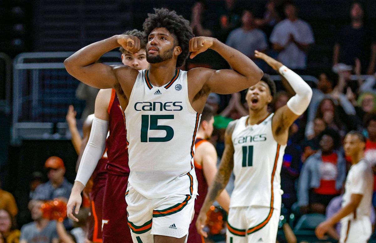 Miami Hurricanes forward Norchad Omier (15) and guard Jordan Miller (11) celebrate as the Hurricanes hold the lead late in the second half against Virginia Tech Hokies at Watsco Center in Coral Gables, Florida on Tuesday, January 31, 2023.
