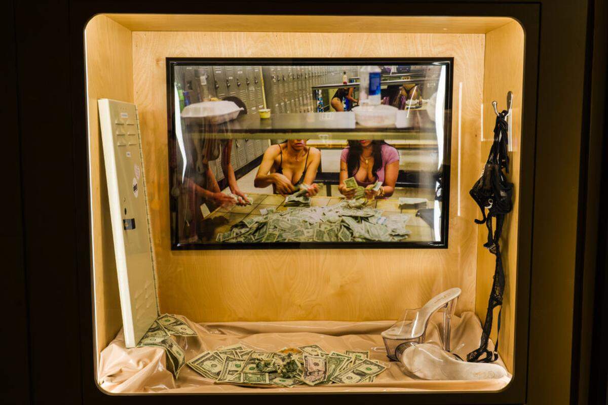 An installation focusing on strip club culture in the exhibition “F*ck Art” at the Museum of Sex.