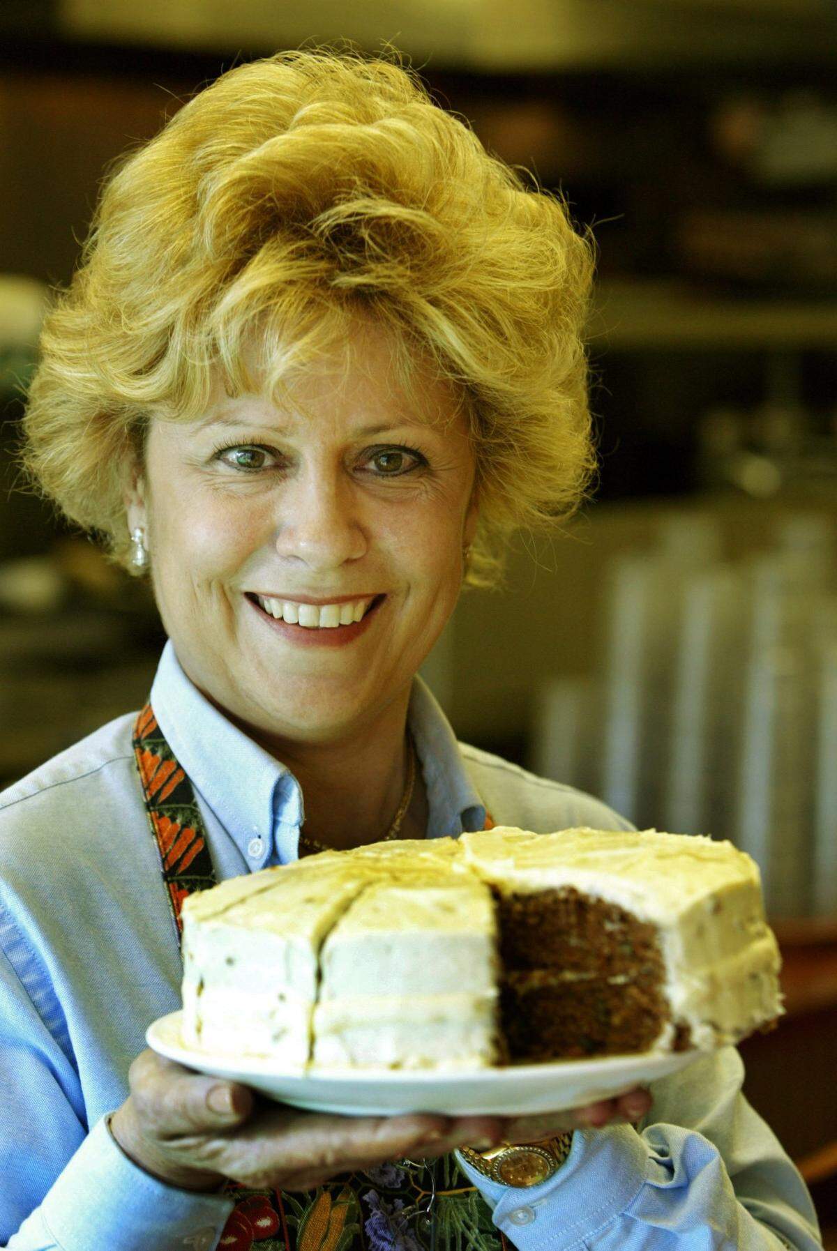 In 2006, Lois Lovett-Gianos, owner of Nick’s Restaurant in Hallandale Beach, shows off a carrot cake.