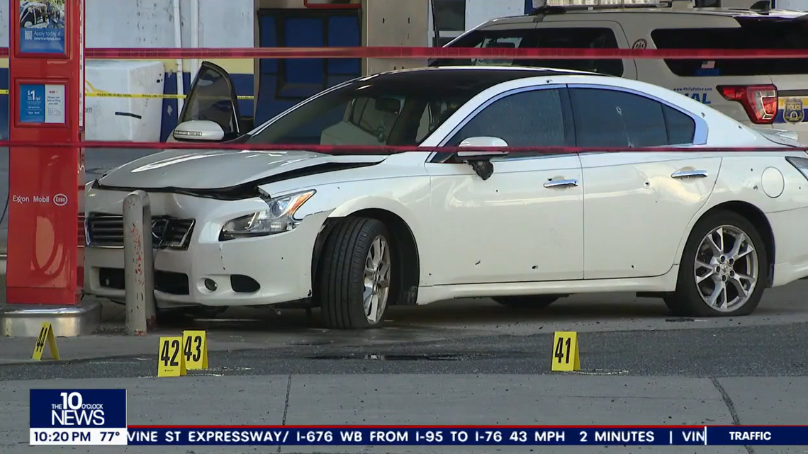 A grandpa and 5-year-old child were injured when someone shot at this car, police in Philadelphia said.