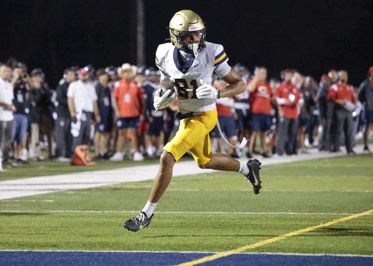 St. Thomas Aquinas wide receiver Julius Jones (81) scores on a pass reception during the game against the Columbus Explorers in the first half at Tropical Park Stadium in Miami, Florida, on Friday, September 5, 2025.