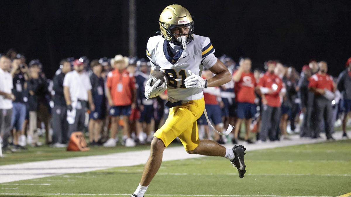 St. Thomas Aquinas wide receiver Julius Jones (81) scores on a pass reception during the game against the Columbus Explorers in the first half at Tropical Park Stadium in Miami, Florida, on Friday, September 5, 2025.