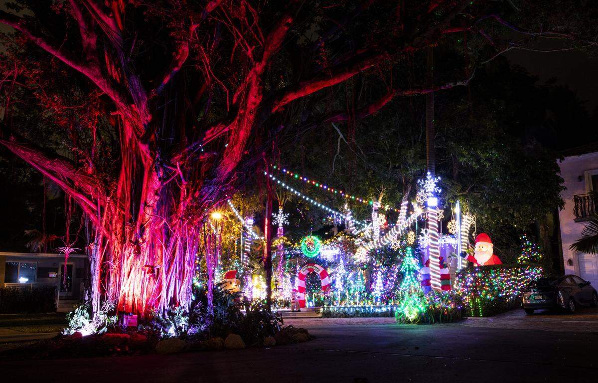 Michael Hornyak’s house is festooned in holiday lights at the end of a cul-de-sac at 3050 Lime Court in Coconut Grove.