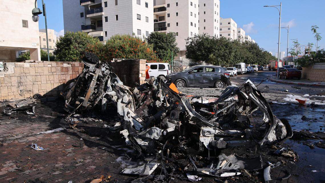 Vehicles damaged by Hamas rockets in Ashkelon, in southern Israel, on Oct. 7.