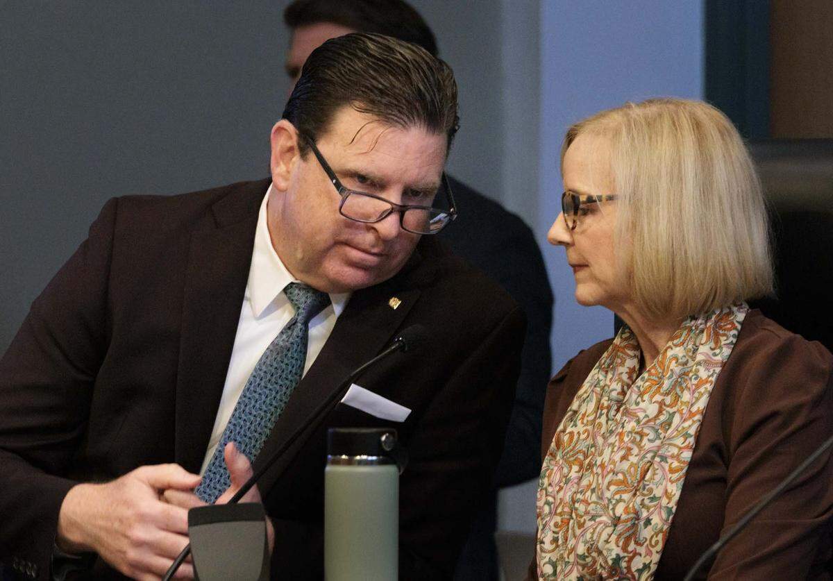 City Attorney George Wysong, left, speaks to Mayor Eileen Higgins during a Miami City Commission meeting on Thursday, May 14, 2026, at Miami City Hall in Miami, Fla. Mayor Higgins' $450 million bond for police and fire stations was discussed.