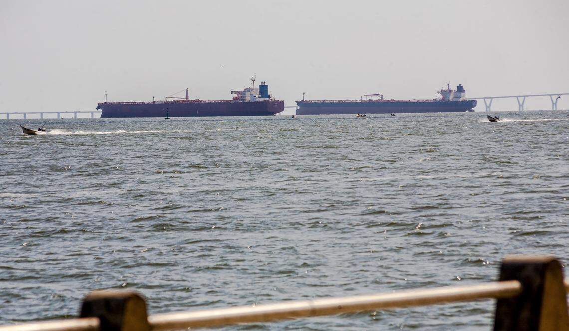 Two crude oil tankers remain anchored on Lake Maracaibo, near Maracaibo, Zulia state, Venezuela on December 17, 2025. US President Donald Trump ordered on December 16, 2025, a "total and complete blockade" of sanctioned oil tankers Venezuela has been using to bypass a six-year-old US oil embargo. 