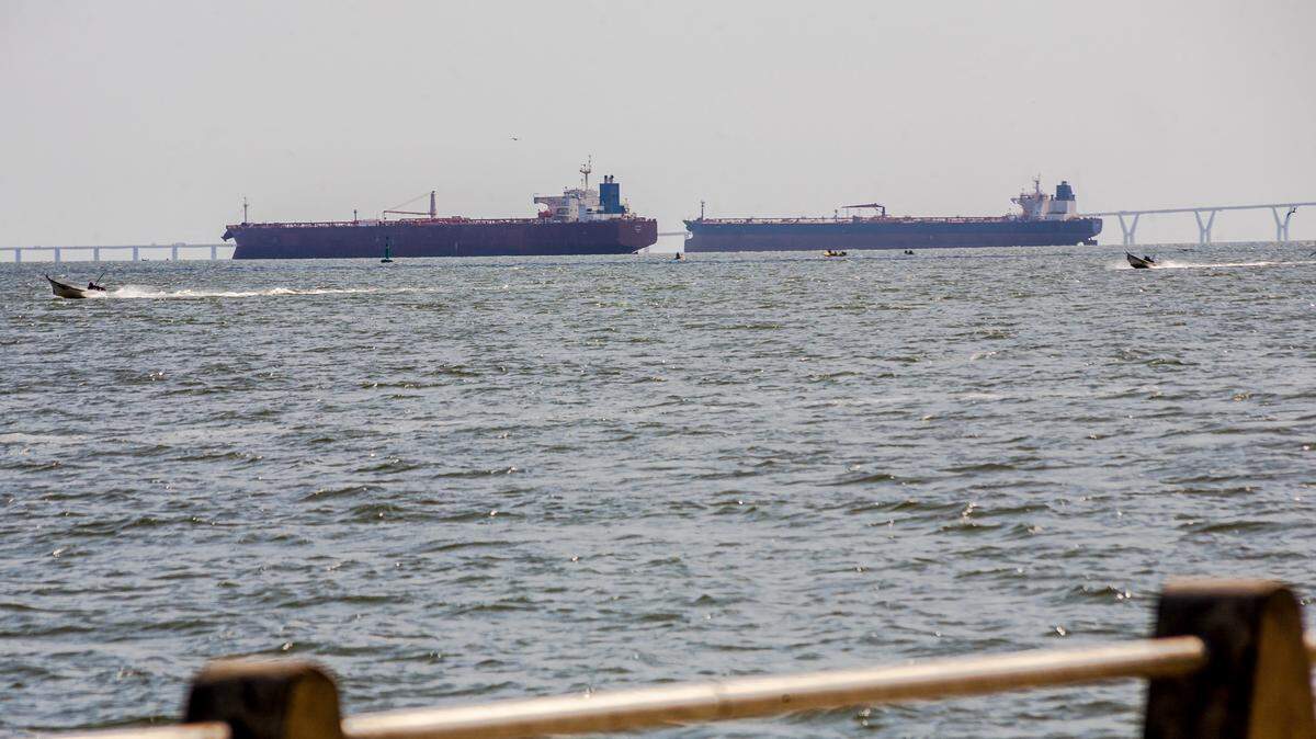 Two crude oil tankers remain anchored on Lake Maracaibo, near the city of Maracaibo, Venezuela, on Dec. 17, 2025. The previous day President Donald Trump ordered a "total and complete blockade" of sanctioned oil tankers Venezuela has been using to bypass a six-year-old U.S. oil embargo. 
