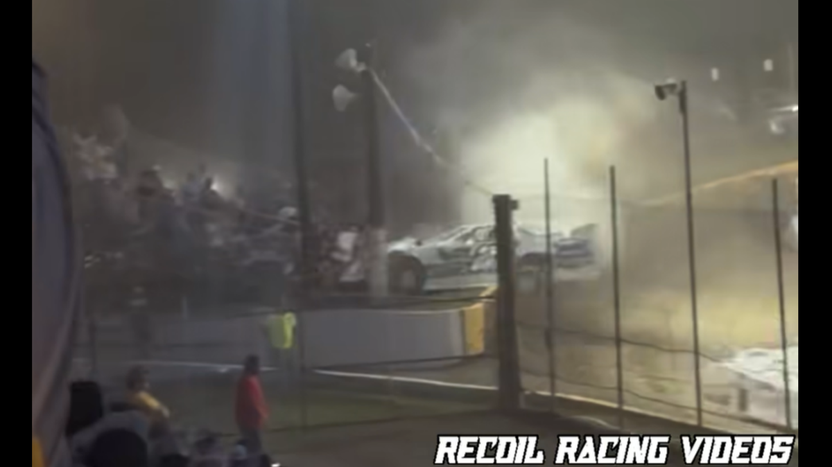Video shows one of the cars drove up the concrete safety wall and then collided with a chain-link fence, injuring 3 spectators, Senoia Raceway reports.