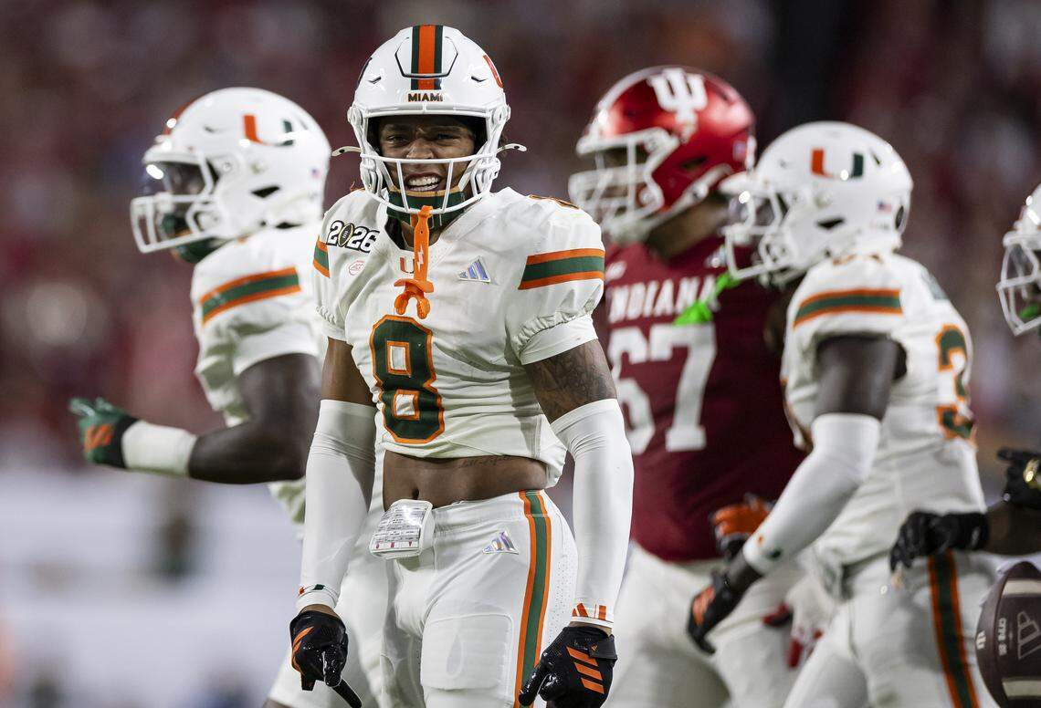 Miami Hurricanes defensive back Jakobe Thomas (8) reacts after tackling Indiana Hoosiers running back Roman Hemby (1) in the first half of their College Football Playoff National Championship Game at Hard Rock Stadium on Monday, Jan. 19, 2026, in Miami Gardens, Fla.