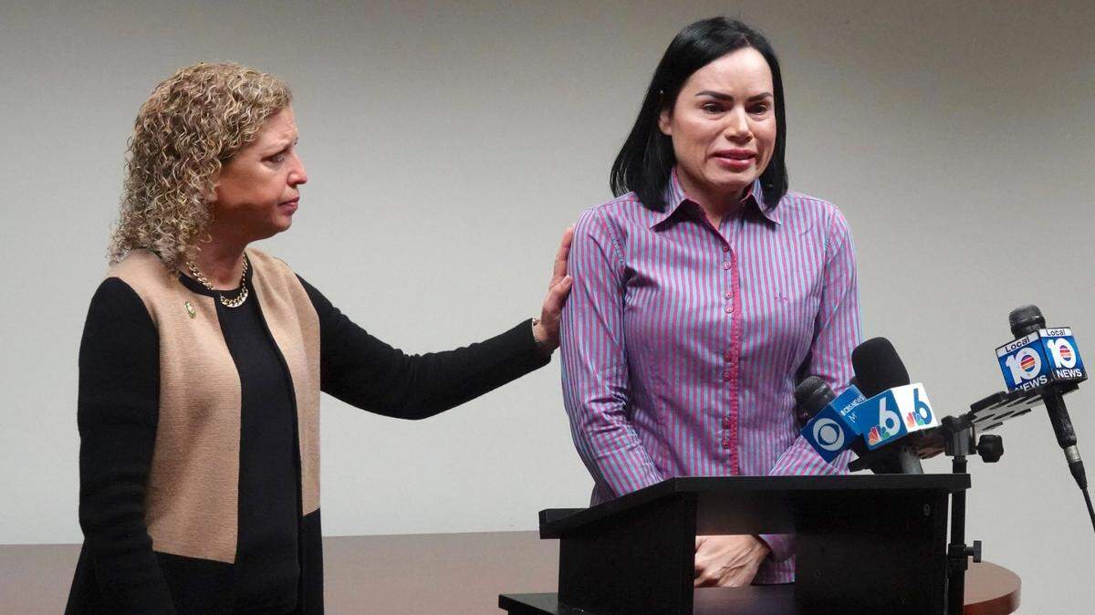 On Monday, Feb. 6, 2023, U.S. Rep. Debbie Wasserman Schultz comforts Anabely Lopes, a Florida resident who had to leave the state for an abortion. Lopes will be her guest at President Joe Biden’s State of the Union address to Congress on Tuesday.