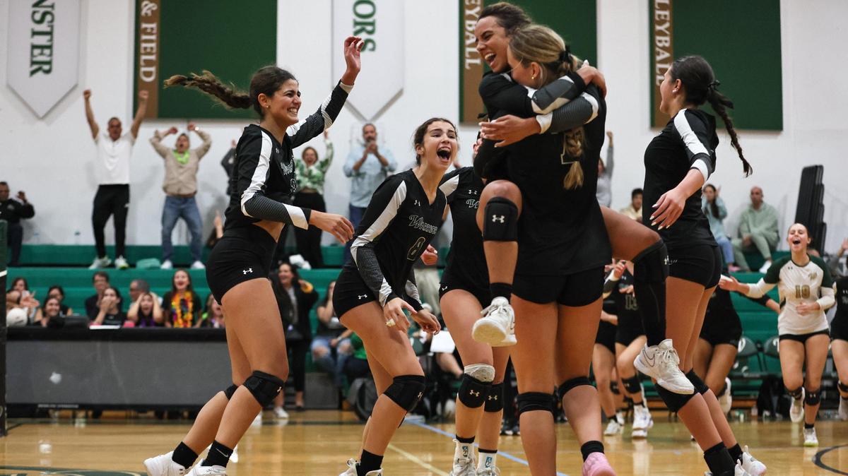 from left: Westminster Warriors Lia Gonzalez (18), Daniella Arollo (8), Chloe Garcia (16), Zoey Matias (12), Giovanna Artiles (7) and Alyana Cadavid (6) celebrate after the game against the Divine Savior Sharks during the Region 5 girls volleyball regional final at Westminster Christian School in Palmetto Bay, Florida, Tuesday, October 29, 2024.