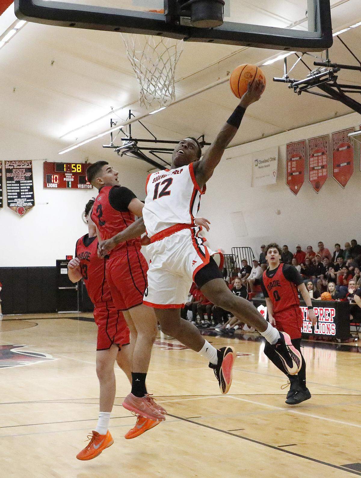 Sagemont Prep Lions David Nealy (12) attempts  a shot against  Dade Christian Warriors during Region 4-1A boys' basketball final game on Saturday, February 28, 2026 at Sagemont Prep School in Weston. Andrew Uloza / for Miami Herald