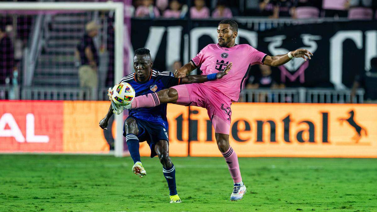 Inter Miami midfielder Yannick Bright (42) and FC Cincinnati midfielder Obinna Nwobodo (5) compete for the ball in the first half of their MLS match at Chase Stadium on Saturday, Aug. 24, 2024, in Fort Lauderdale, Fla.