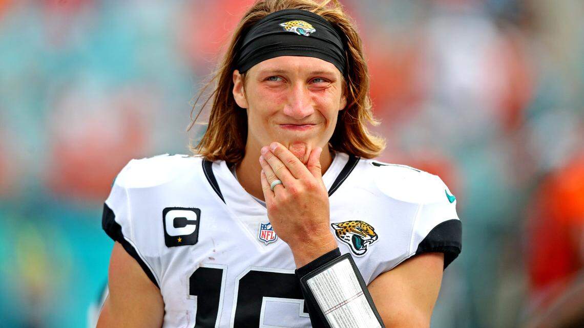 Sep 19, 2021; Jacksonville, Florida, USA; Jacksonville Jaguars quarterback Trevor Lawrence (16) reacts on the sidelines during the second half against the Denver Broncos at TIAA Bank Field. Mandatory Credit: Mark J. Rebilas-USA TODAY Sports
