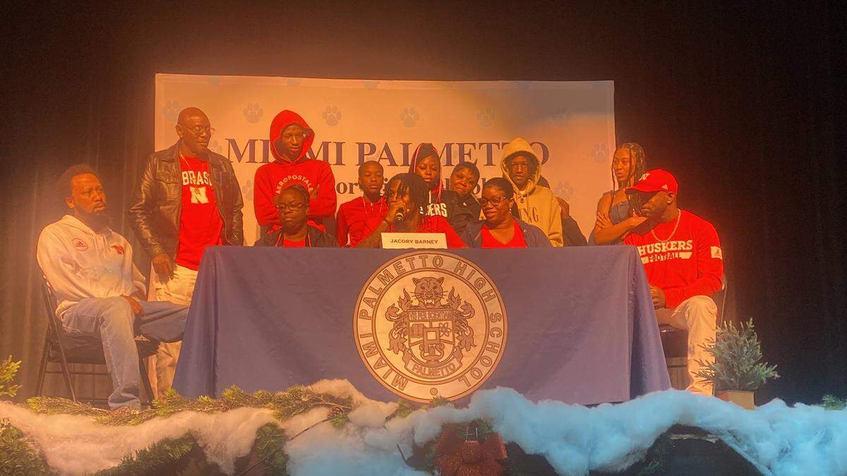 Miami Palmetto’s Jacory Barney signs with the Nebraska Cornhuskers on Wednesday, Dec. 20, 2023.