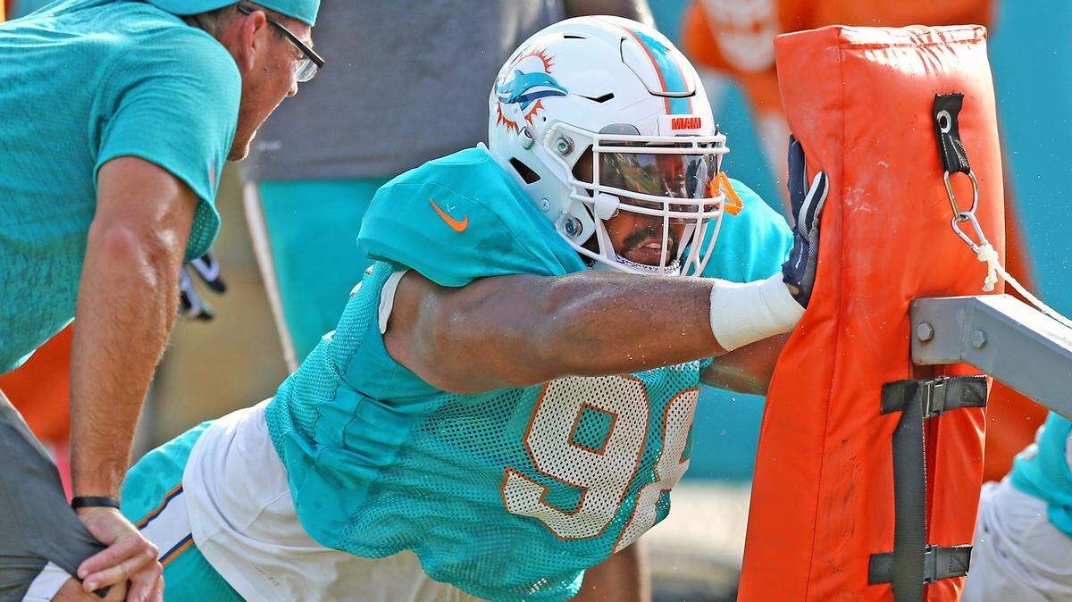 Miami Dolphins defensive tackle Gabe Wright (98), seen here at training camp on Monday, was released later in the day after an incident involving Kenyan Drake during practice.