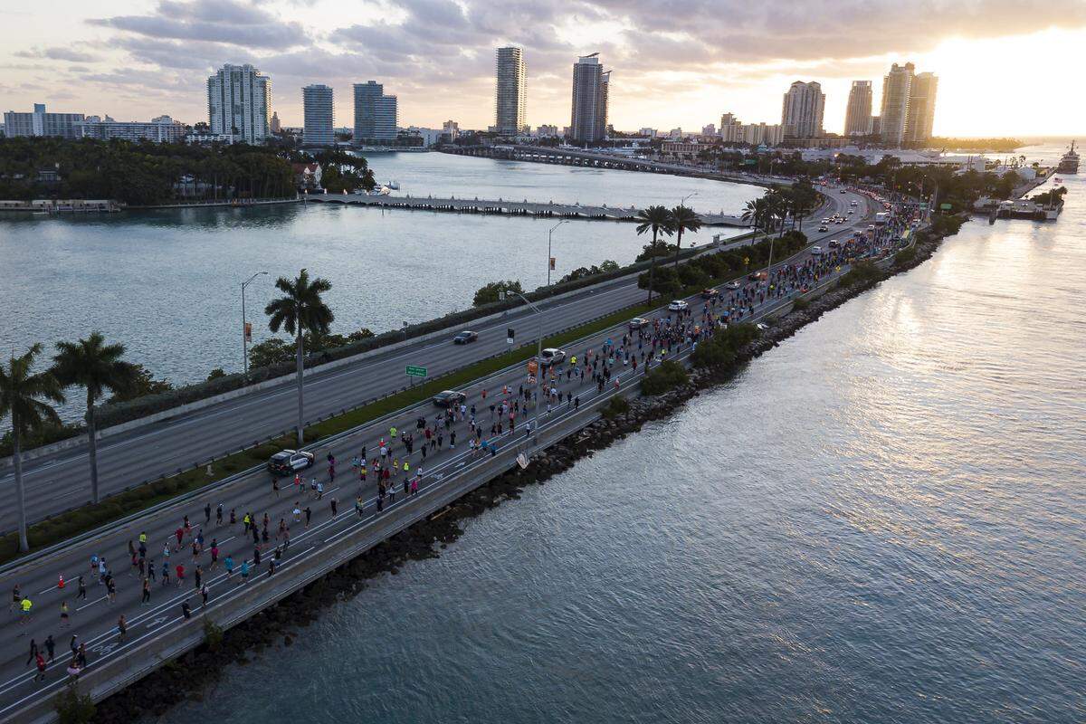 An aerial view of MacArthur Causeway shows runners making their way toward Miami Beach from downtown Miami as they participate in the 18th annual Life Time Miami Marathon and Half Marathon on Sunday, February 9, 2020. There were more than 20,000 combined runners registered for the marathon and half marathon.