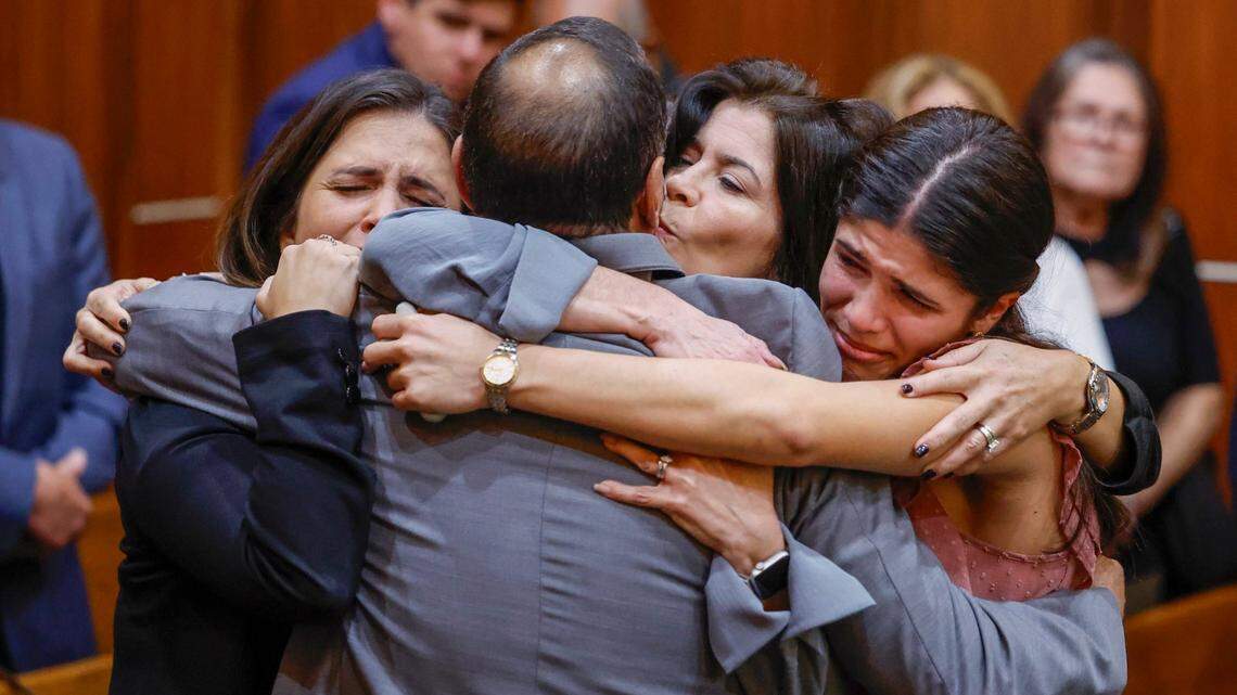 Suspended MIami-Dade Commissioner Joe Martinez hugs his family as they react to the guilty verdict by the jury in Judge de la O’s courtroom on Thursday, November 7, 2024. Martinez, a former police officer, was convicted of accepting $15,000 in exchange for helping with legislation that would have benefited a constituent.