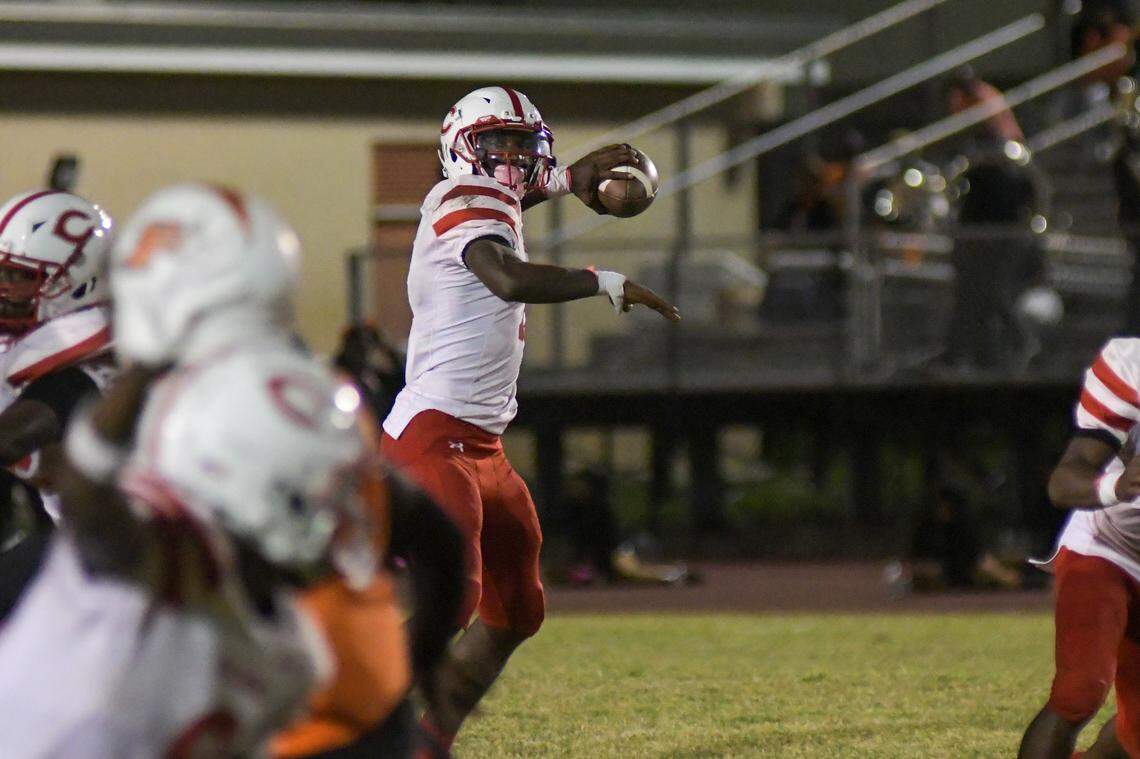 Plantation quarterback Amer Ellis looks to pass against Piper in a high school football game on Friday, Oct. 28, 2022 at Piper High School in Sunrise, Florida.
