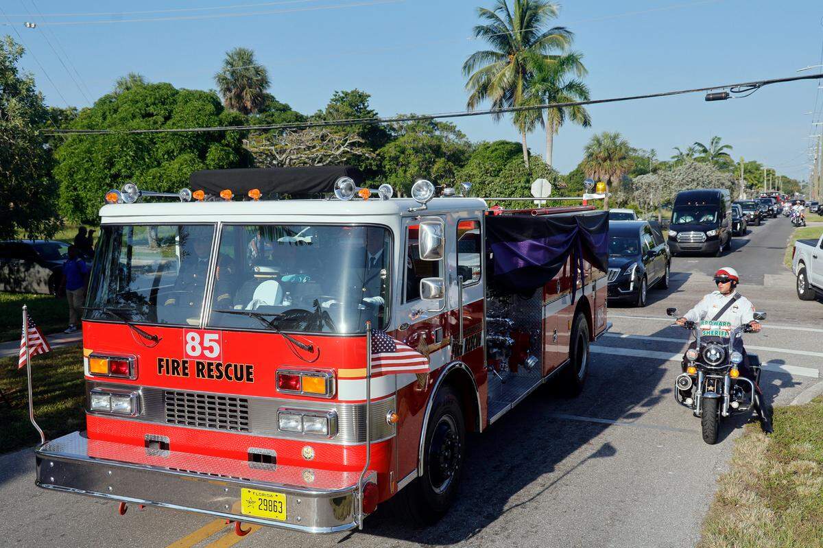 The funeral procession for Broward Sheriff Fire Rescue Battalion Chief Terryson Jackson leaves the L.C. Poitier Funeral Home in Pompano Beach on Friday, Sept. 8, 2023. Jackson died in a helicopter crash on Monday, Aug. 28, when he and two BSFR colleagues were returning to the airport after responding to an emergency call. (Amy Beth Bennett / South Florida Sun Sentinel)