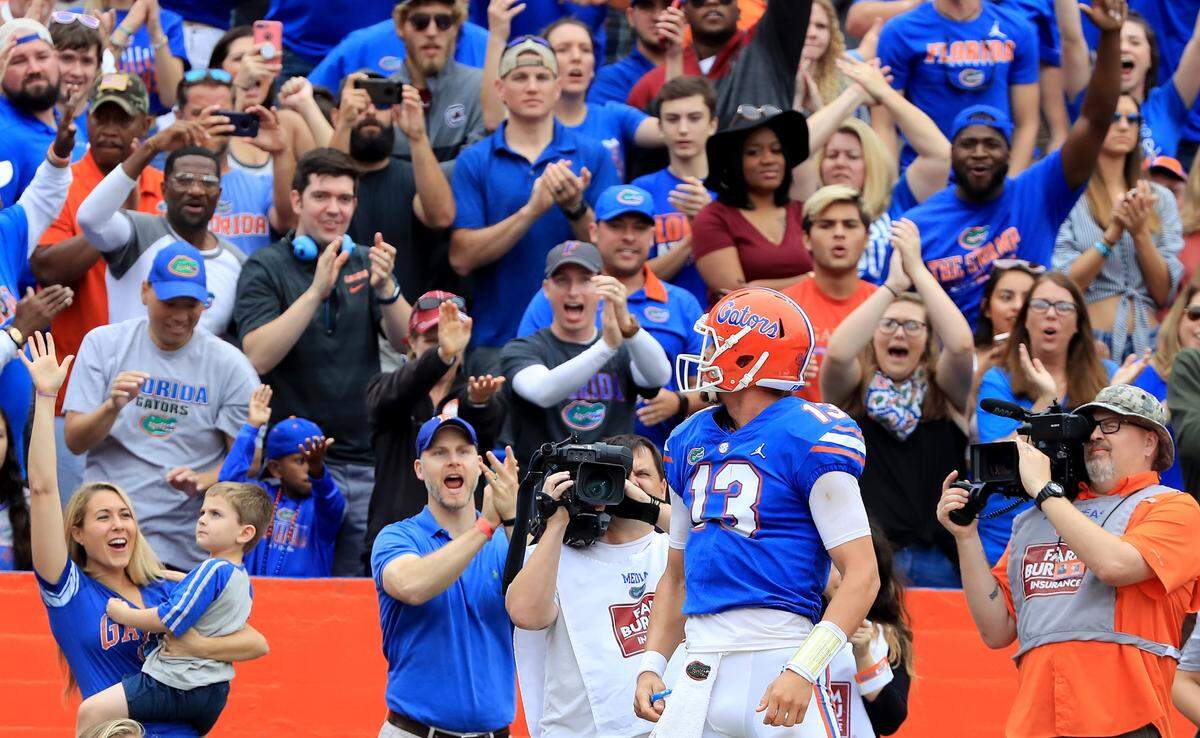 Feleipe Franks #13 of the Florida Gators celebrates after crossing  the goal line for a touchdown during the game against the South Carolina Gamecocks at Ben Hill Griffin Stadium on November 10, 2018 in Gainesville, Florida.