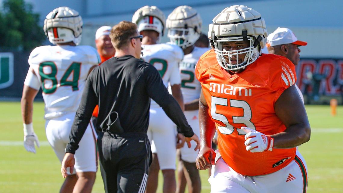 \Miami Hurricanes offensive lineman Jakai Clark (53) warms up for practice at Greentree Practice Field at the University of Miami in Coral Gables on Thursday, August 18, 2022.