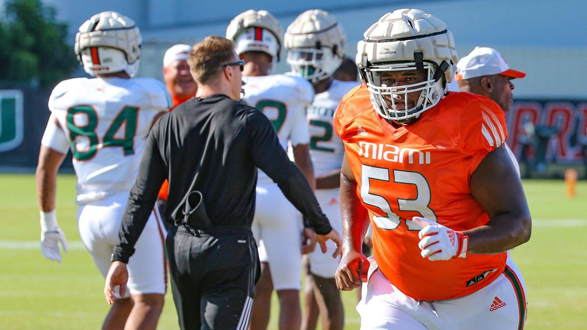 \Miami Hurricanes offensive lineman Jakai Clark (53) warms up for practice at Greentree Practice Field at the University of Miami in Coral Gables on Thursday, August 18, 2022.