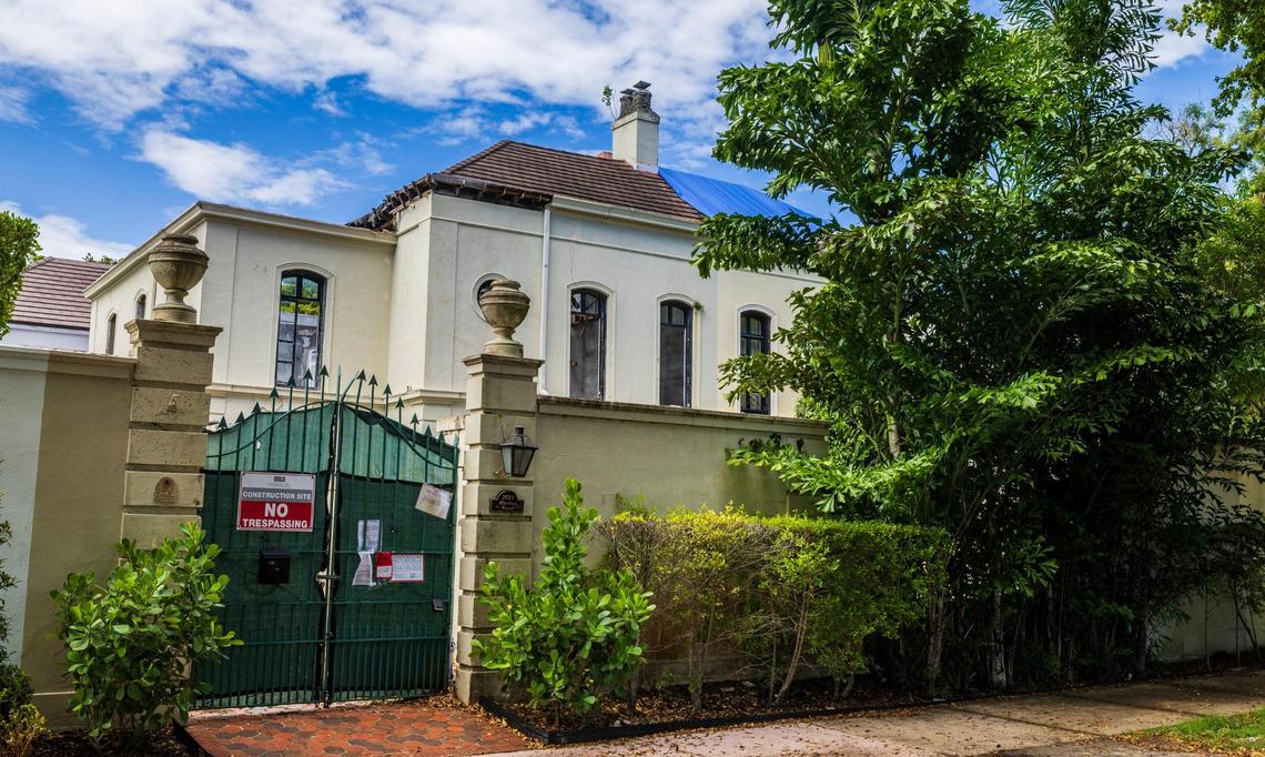 A view of the entrance to a landmark but long-vacant Coral Gables house at 1021 Hardee Road in the city’s historic French City Village that is in danger of collapsing after years of neglect by its owners. The shell of the house is all that’s standing after its first-floor roof was removed and the interior gutted a year ago.