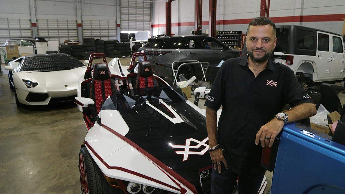 Alex Vega, owner of The Auto Firm, in his Kendall shop. Three men were convicted on Wednesday, May 21, 2025, in a murder-for hire trial in Miami involving a hit on Vega, who has designed cars for Usain Bolt, Marc Anthony and other celebrities. He was shot three times in the driveway of his Kendale Lakes home.