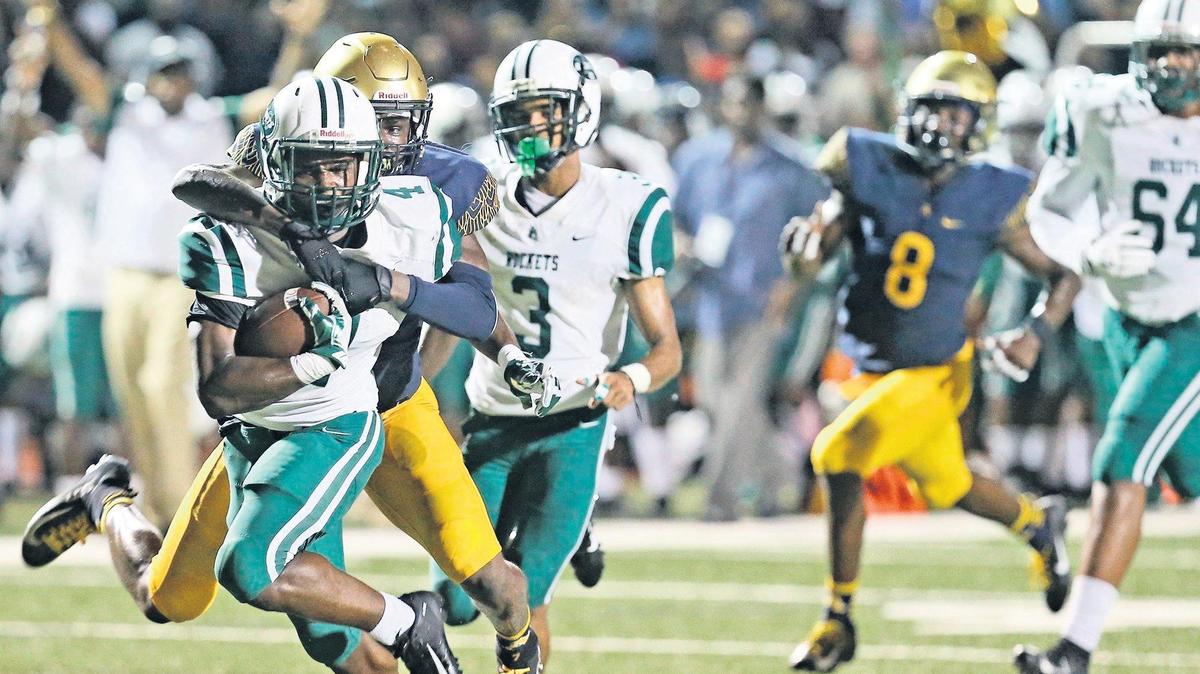 St Thomas Aquinas Jordan Battle (7) tackles Lexington Joseph (4) after a large gain in the second quarter Miami Central at St Thomas Aquinas HS in Fort Lauderdale, Florida, on Friday, Sept. 21, 2018.