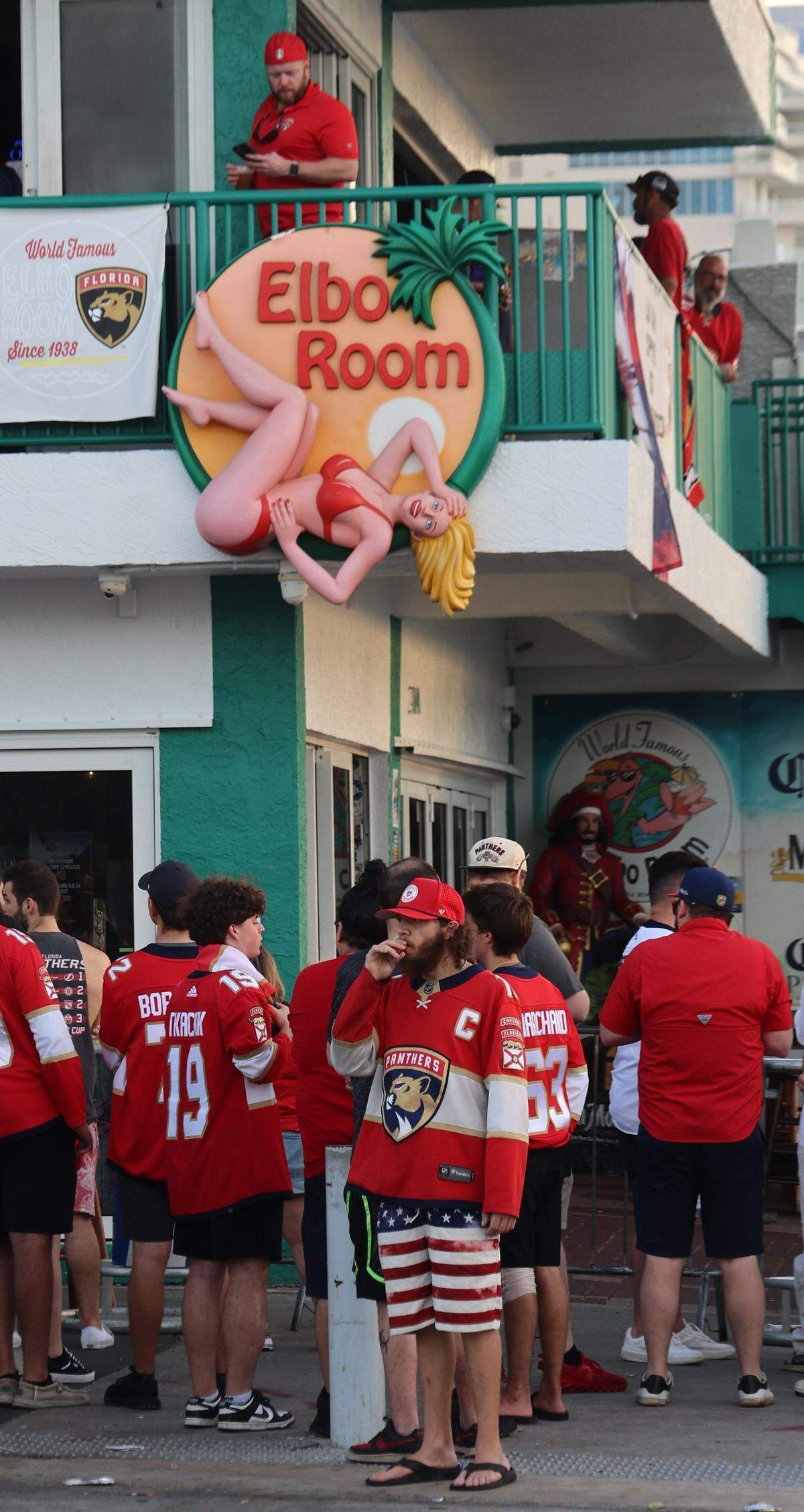 Panthers fans gather outside the Elbo Room in Fort Lauderdale at sunrise the day after the Florida Panthers won the Stanley Cup Final for the second time on Wednesday, June 18, 2025.