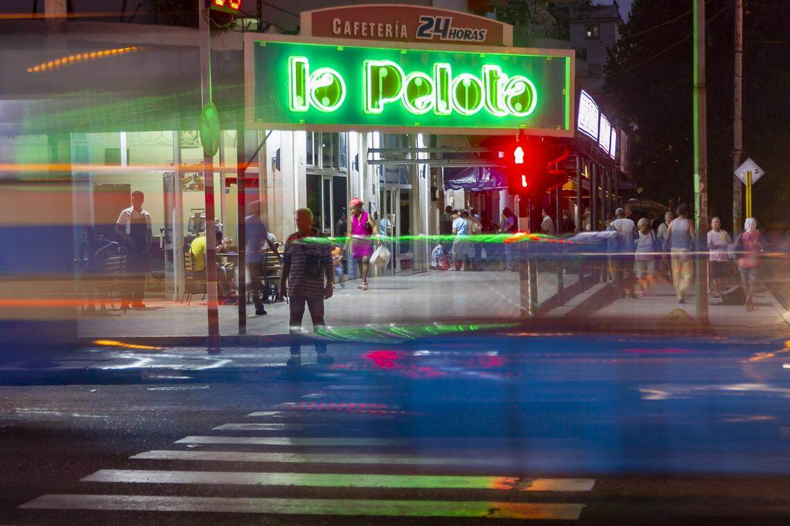 A restored neon sign of La Pelota sits on the corner of Avenida 23 and Calle 12 in Havana, Cuba.