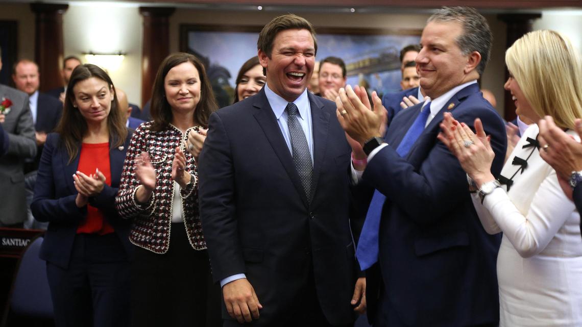 Florida Gov.-elect Ron DeSantis, center, laughs when he is acknowledged in the Florida House on Tuesday, Nov. 20, 2018, with other incoming members of the Florida Cabinet. From left, Agricultural Commissioner-elect Nikki Fried and Attorney General-elect Ashley Moody, Chief Financial Officer Jimmy Patronis and outgoing Attorney General Pam Bondi.